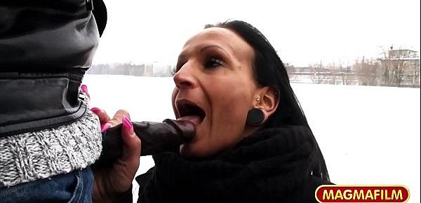  German MILF riding cock on the Berlin Wall in the snow